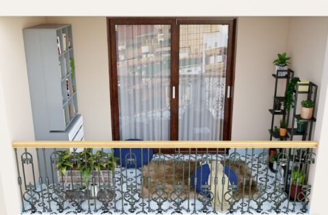 Modern apartment balcony with metal safety grill, patterned tiles, plants and low seating