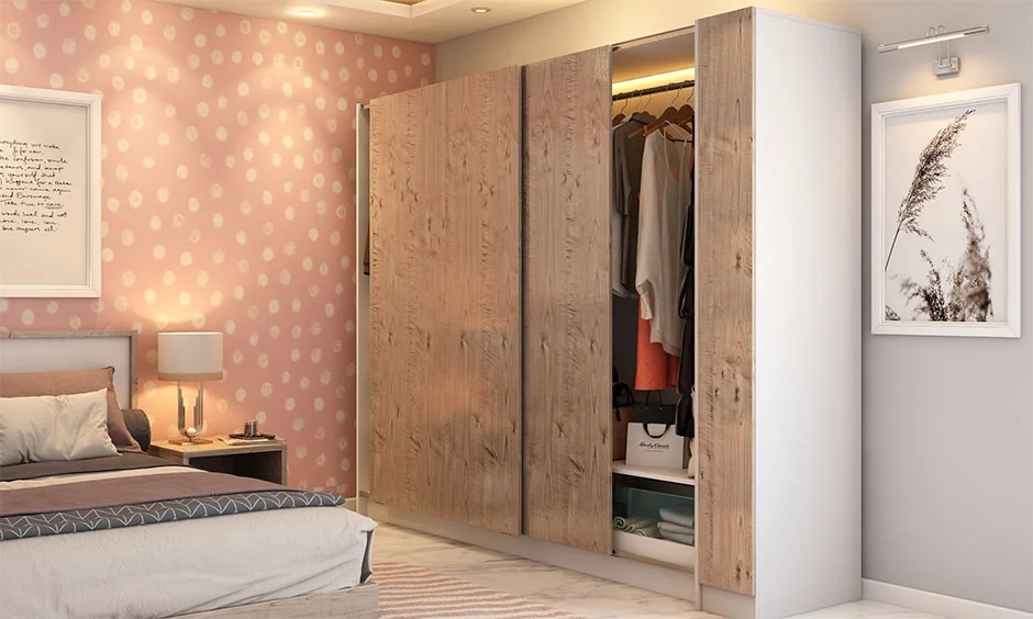 Wood-grain Sunmica design covers wardrobe shutters with a contrasting matte white finish.