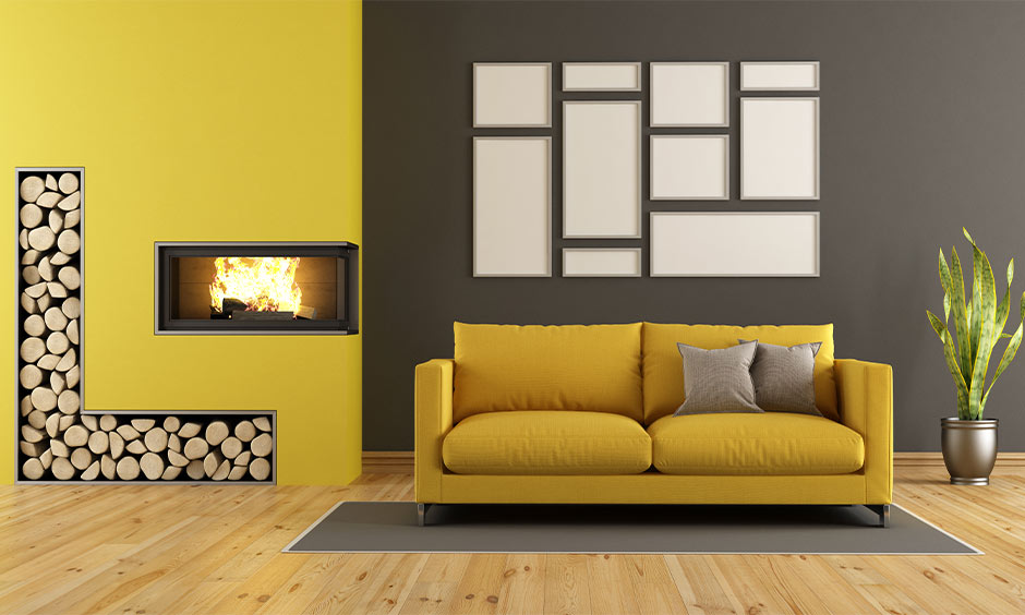 Bold accent wall with mustard sofa showing outdated interior design trends in modern homes