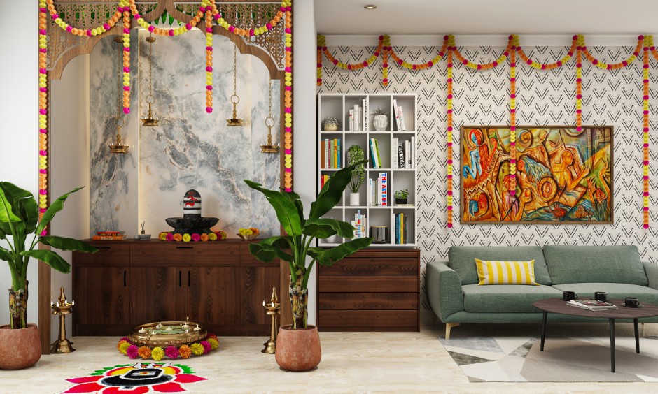 Peaceful pooja corner in living area planned as per west-facing house Vastu plan with pooja room.