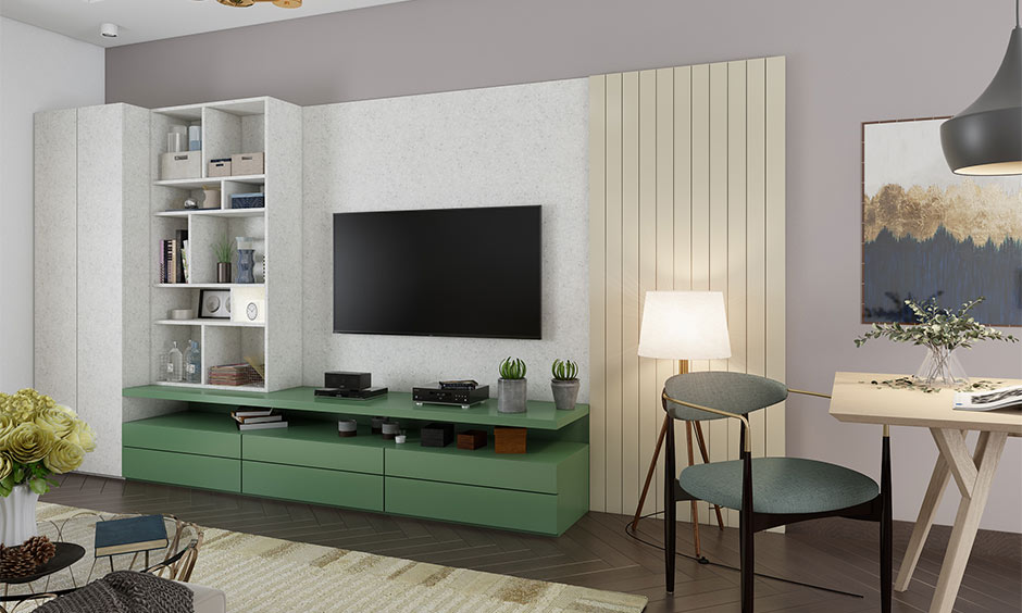 Beige and sage green living room with warm lighting, modern furniture and a calm, airy interior style