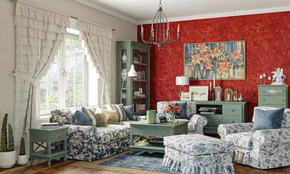 Sage green furniture in living room with earthy tones, vintage details and a warm, timeless look