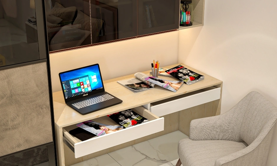 Minimalist bedroom study desk featuring handleless drawers and built-in task lighting for a compact workspace.