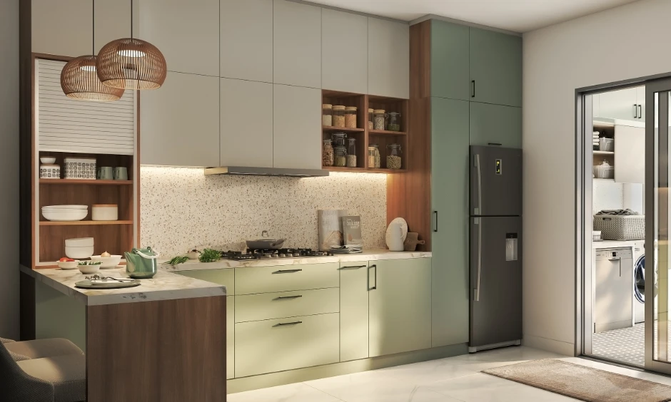 Modern L-shaped kitchen design with earthy wood cabinets, tall pantry units, and a breakfast counter for a 3BHK.