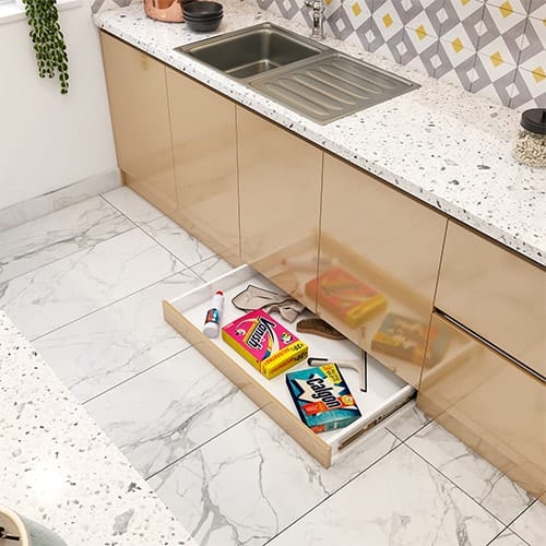 Home interior designer in Ghaziabad created a skirting drawer that utilizes the dead space