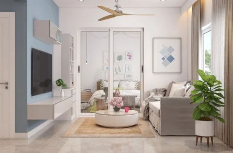 Luxury blue and white living room by a living room designer in Chennai with elegant modern interiors