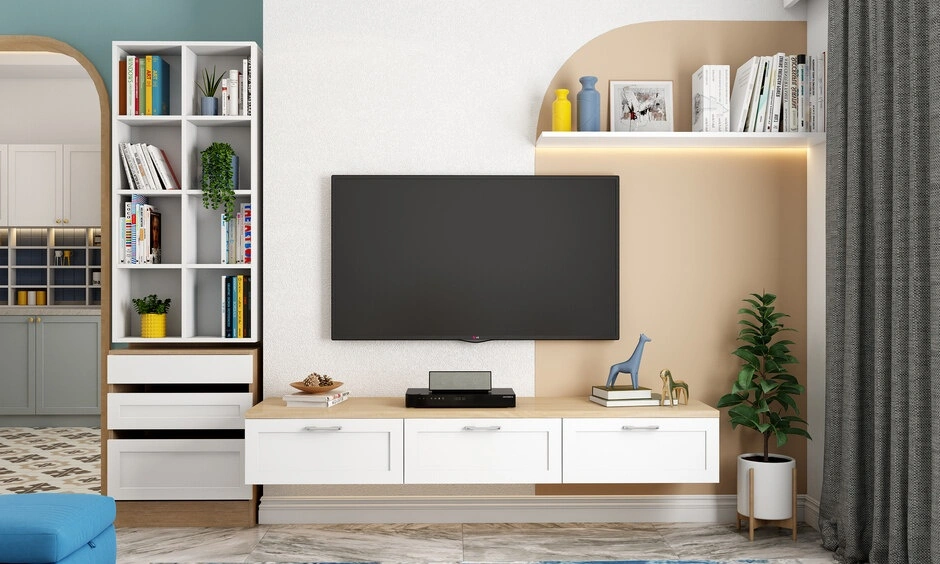 Sleek modern living room with TV unit by a professional living room designer in Chennai