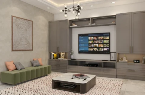 Modern living room with sleek TV cabinet, grey storage units and soft ambient lighting.