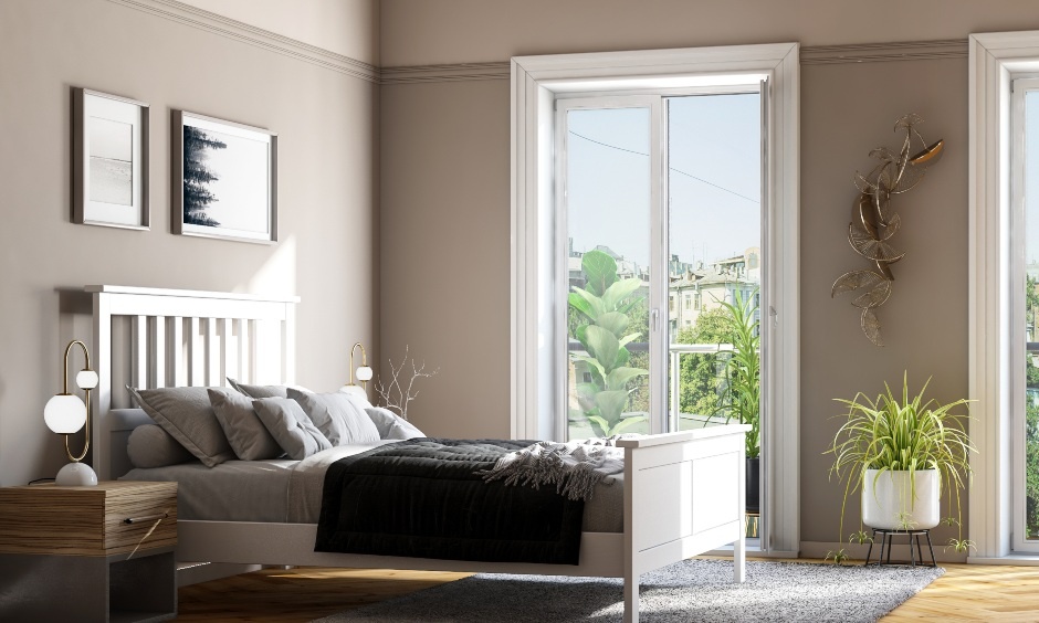 Bed placed away from bathroom wall for better Vastu energy and improved sleep quality