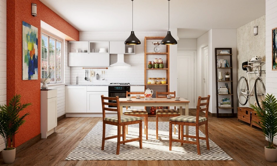 Bright modular kitchen with a cosy dining setup designed for a modern Pune home.