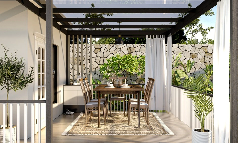 Slim white terrace railings framing an open dining space with bright, airy outdoor views.