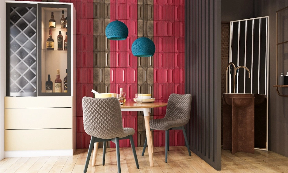 Raised wall panels and patterned tiles create layered texture in the dining area. 