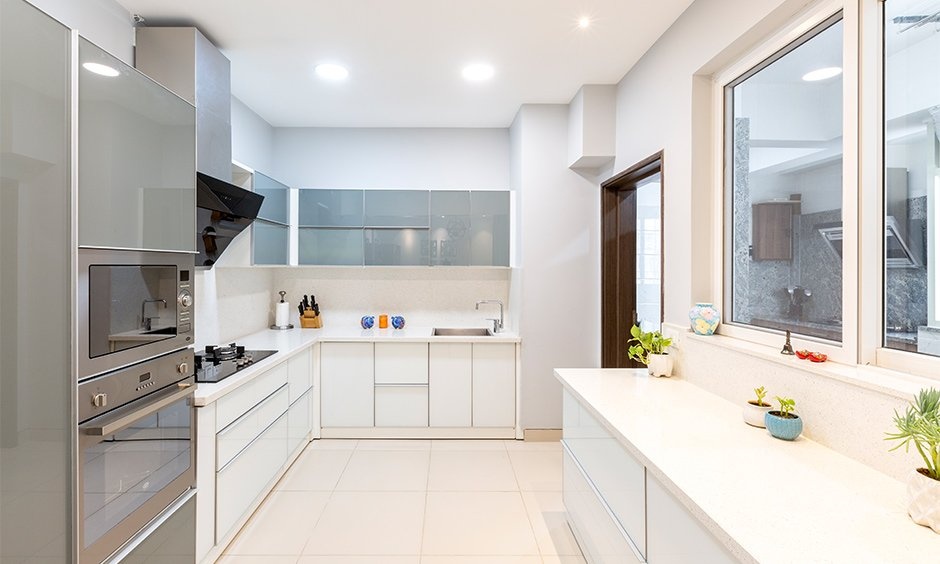 Popular modular kitchen design trends in Ahmedabad homes including Vastu-compliant layouts.