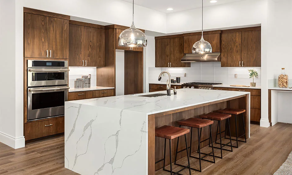 Sleek minimalist kitchen ideas with seamless worktops and clean lines.