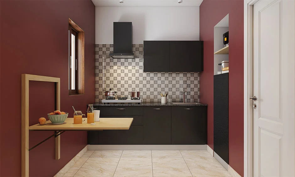 Compact sleek kitchen with a wall-mounted dining table maximises small spaces.