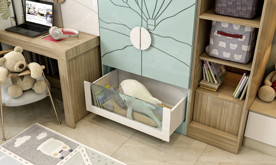 Kids wardrobe with pull-out storage drawer, open shelves and integrated study desk.