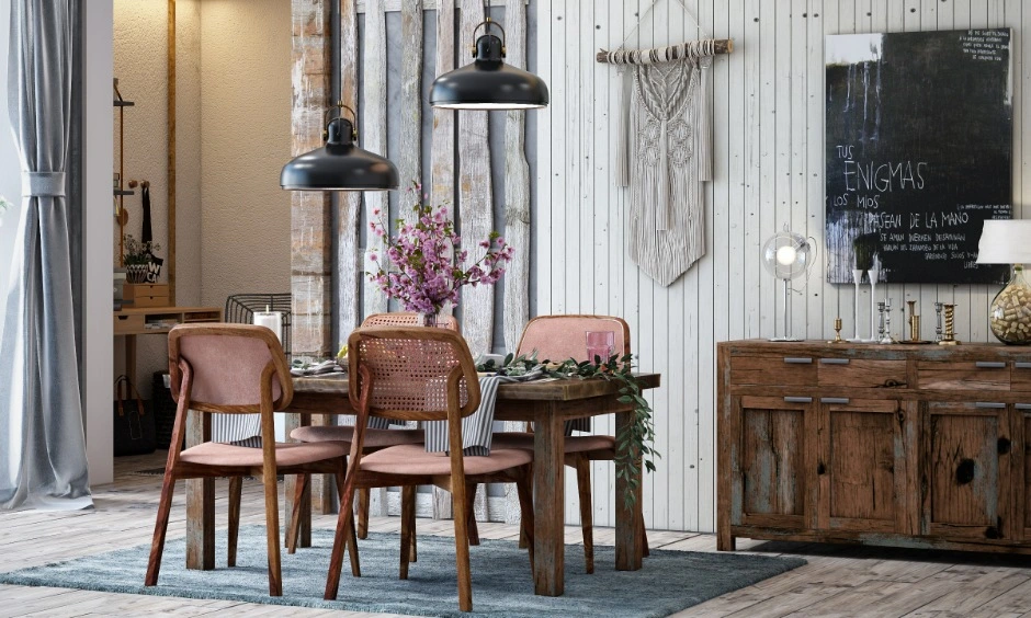 Dining space with reclaimed wood furniture, cane chairs and wall panelling showing sustainable building materials, Bangalore homes should choose with care