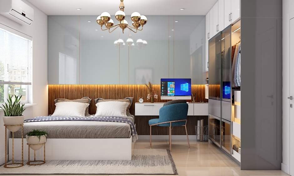 Minimalist bedroom styled with a subtle queen-size bed that balances the busy aesthetic of the room layout.