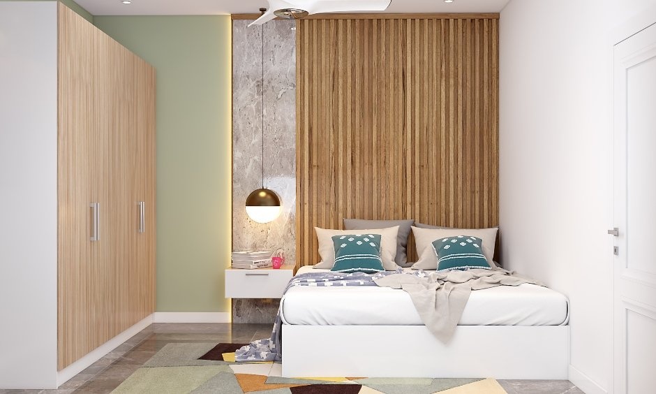 Contemporary sleeping zone utilizing elegant wooden accents to beautify a durable queen bed's appearance.