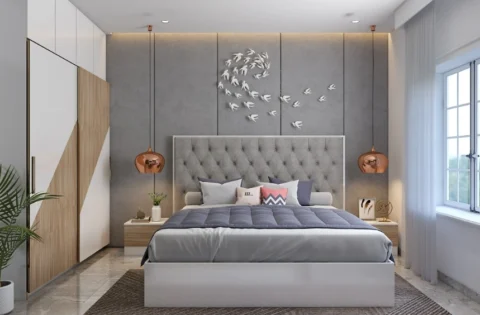 Modern bedroom design with a tufted headboard, pendant lights, and a sleek wardrobe design