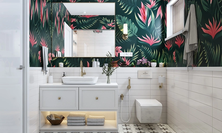 Low-cost Indian bathroom design, which has tropical wallpapers to add a luxurious feel to the space