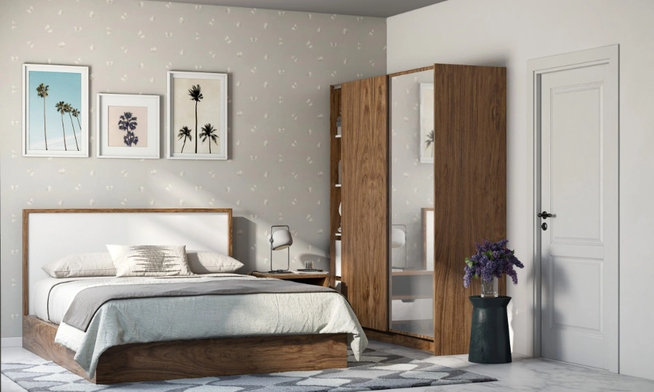 Teak wood wardrobe shutters add warmth, durability, and timeless appeal to the bedroom.