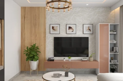Modern Mumbai living room with soft colours, wall panelling and contemporary furnishings.