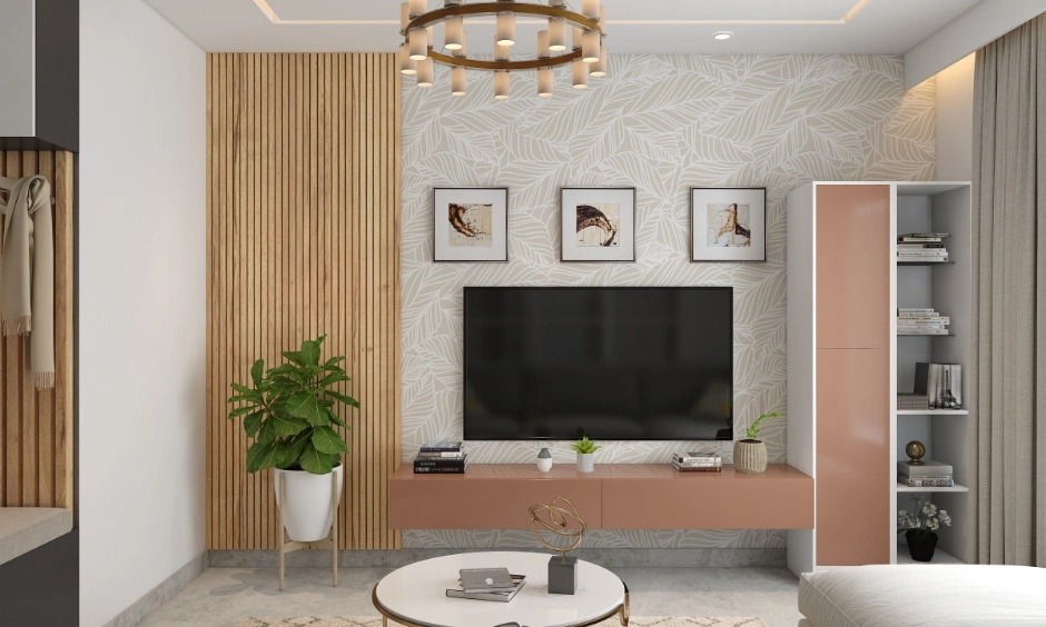 Modern Mumbai living room with soft colours, wall panelling and contemporary furnishings.