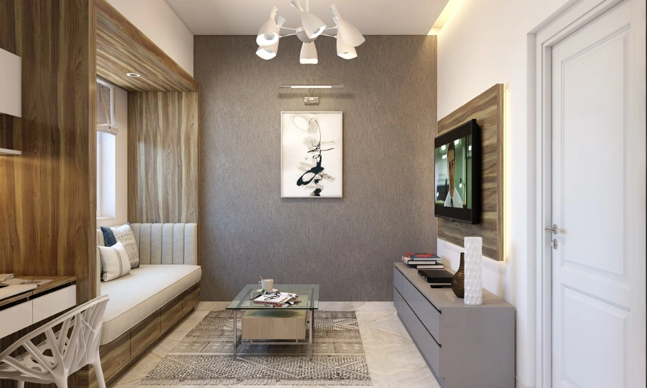 Low budget living room interior design with modular storage, wooden finishes, accent wall and space optimisation for Mumbai apartments.