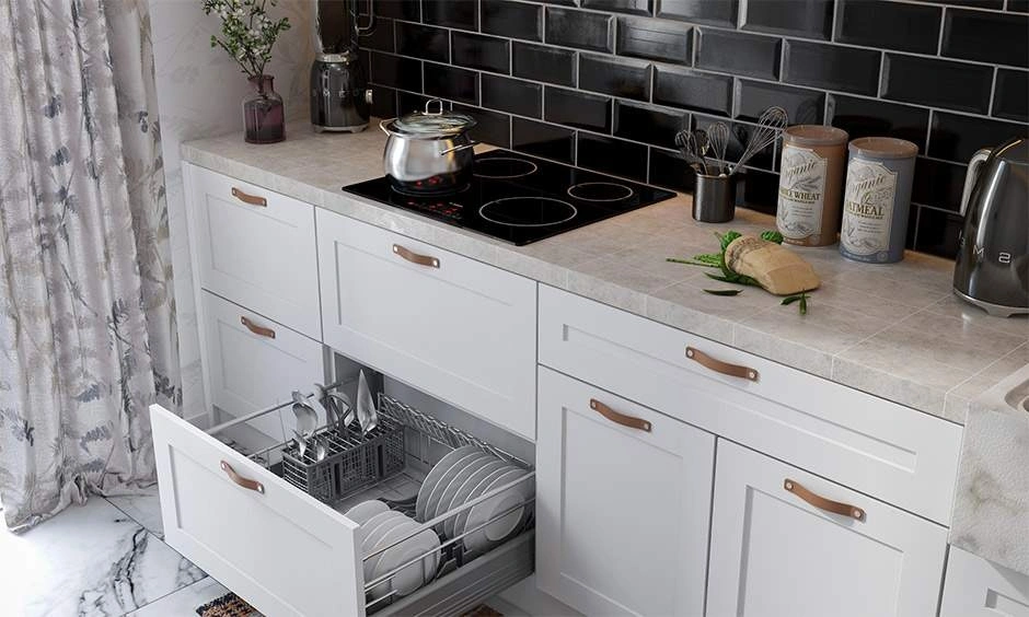 Glazed ceramic wall tiles create a clean and stylish modular kitchen backdrop.