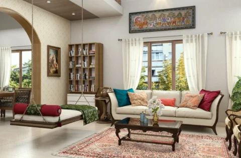 Traditional accents and modern furniture create a balanced living room in a Vizag home.
