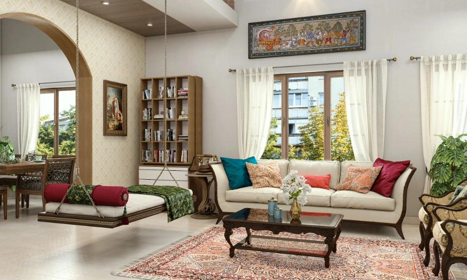 Traditional accents and modern furniture create a balanced living room in a Vizag home.