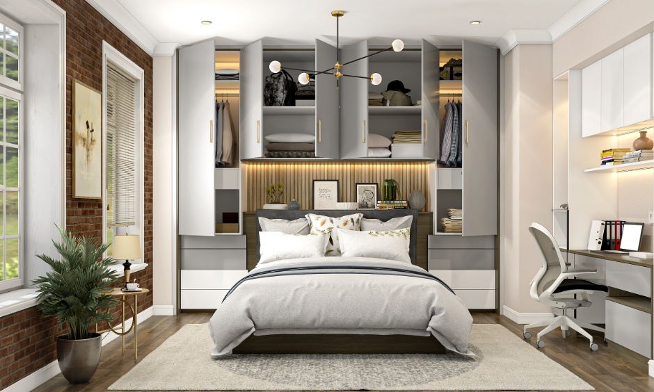 Floor-to-ceiling wardrobes maximizing vertical space in a compact 2BHK apartment transformation.