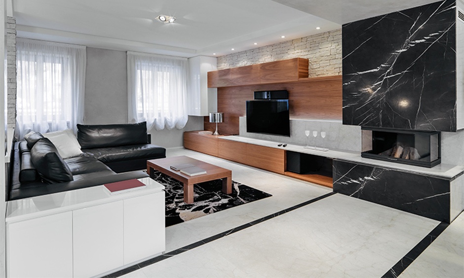 Large-format marble flooring and custom furniture giving a premium apartment with luxury finishes a hotel vibe.