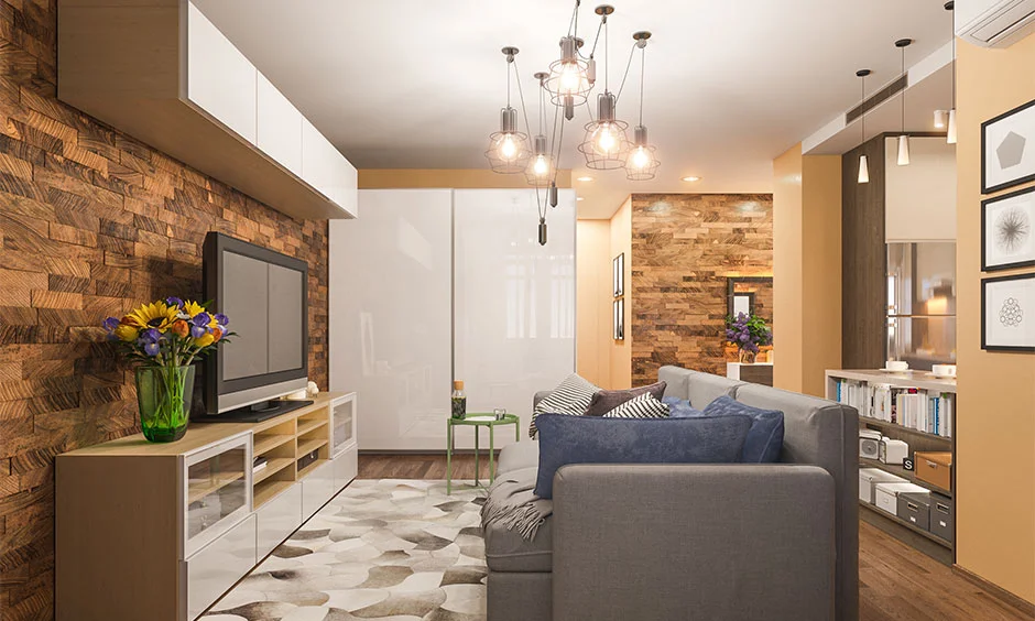 Cabinet lighting and a statement chandelier combine cool and warm light for flexibility.