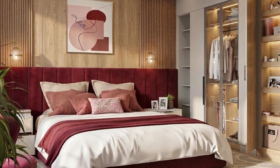 Burgundy and wood interior design colour theme for a luxurious bedroom with an upholstered bed and wardrobe