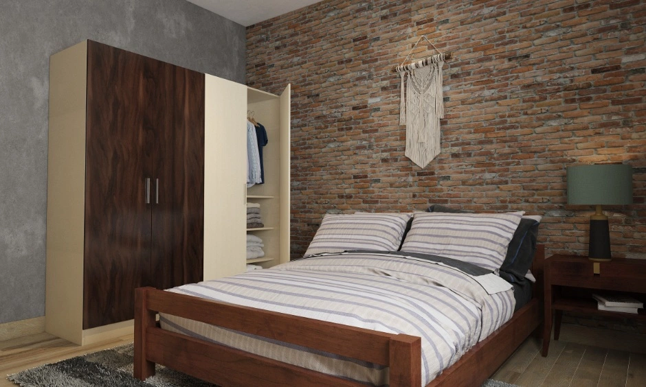 Brick texture feature wall paired with wood furnishings in an earthy Hyderabad home design.