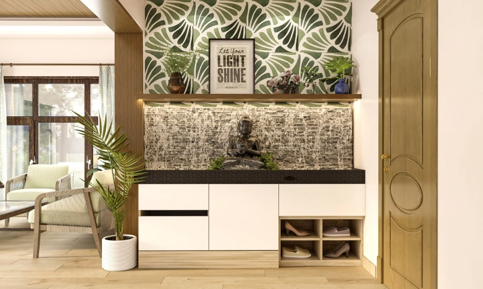 Leafy botanical wallpaper creates a fresh and welcoming entrance with natural green tones.