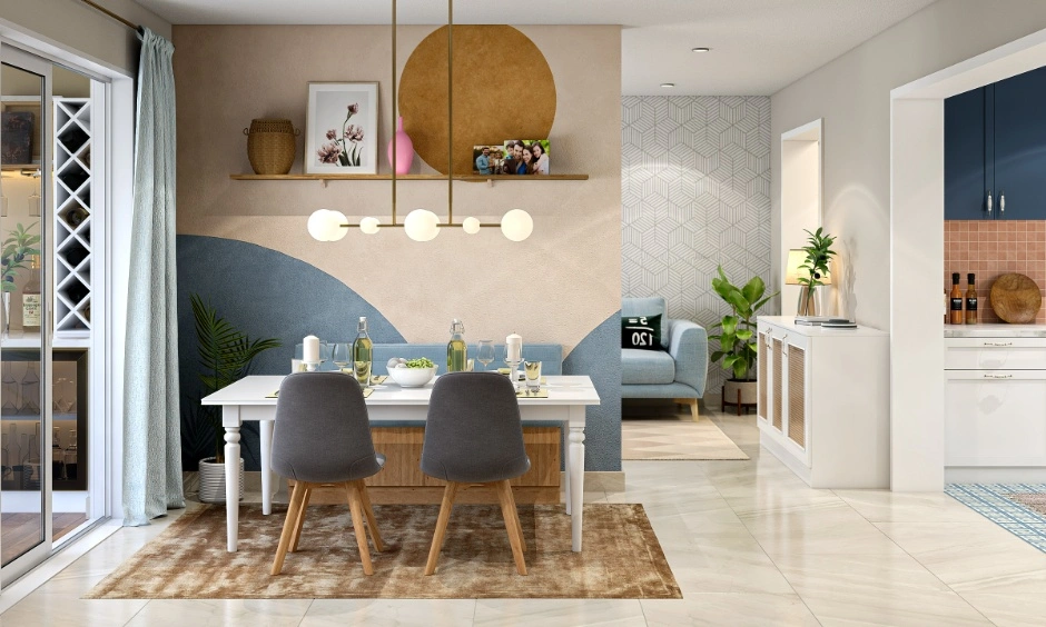 Separate dining and lounge areas occupying different arms of an open L-shaped room layout.
