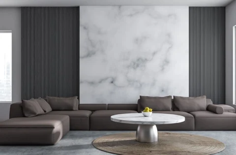 Marble texture wallpaper behind an Italian sofa expanding a modern living room space.
