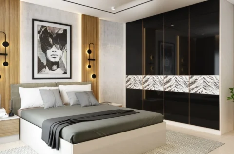 High-gloss black wardrobe panels create a sleek storage solution with a premium modern look.