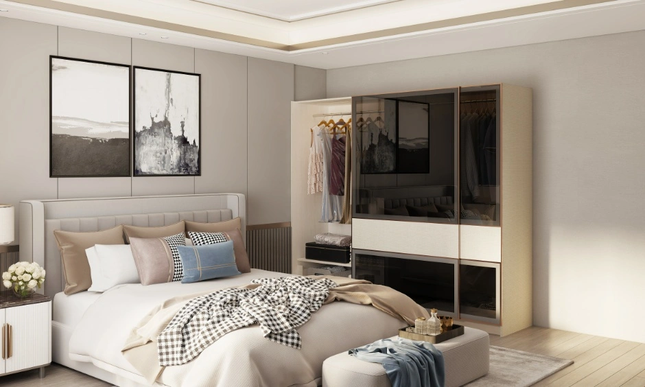 Glossy glass wardrobe panels create a refined finish and enhance visual depth.