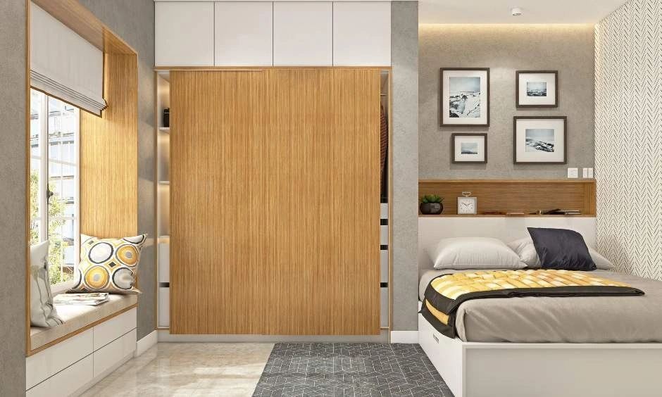 Dual-tone sliding wardrobe showcases a practical balance of glossy and matte finishes