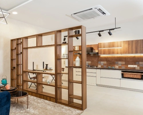 Open kitchen interior displayed at designcafe Surat.