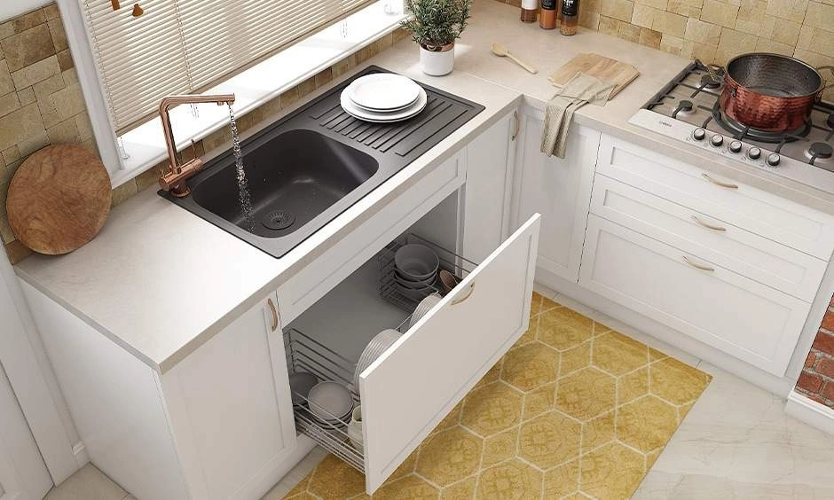 Under-sink storage keeps cleaning essentials organised and easily accessible near the sink.