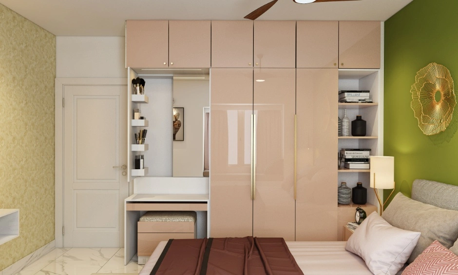 Gloss laminated pink modular wardrobe with a built-in vanity and bookcase.