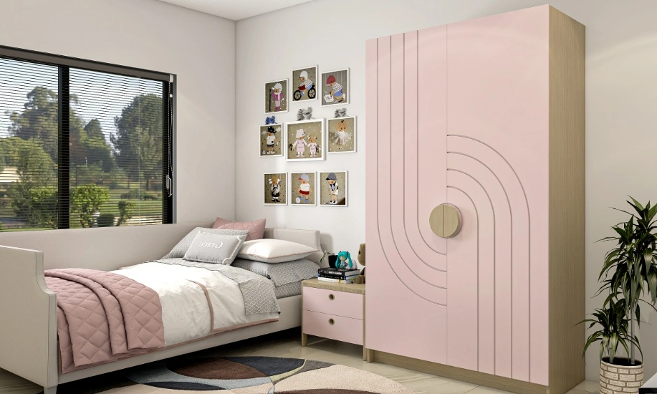 Dusty rose pink wardrobe with a laminate finish designed for a kids' bedroom.