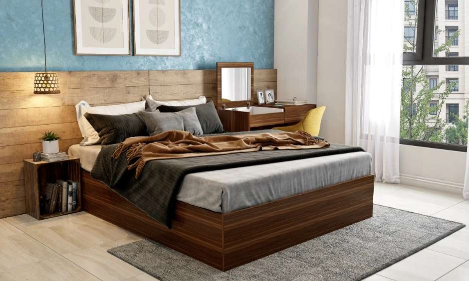 Luxury bedroom design Vizag with wood headboard, pendant light and dressing corner