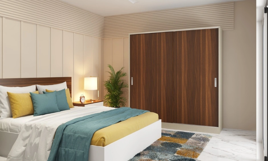 Interior design trends Vizag 2026 bedroom with sliding wardrobe, wall panels and layered bedding