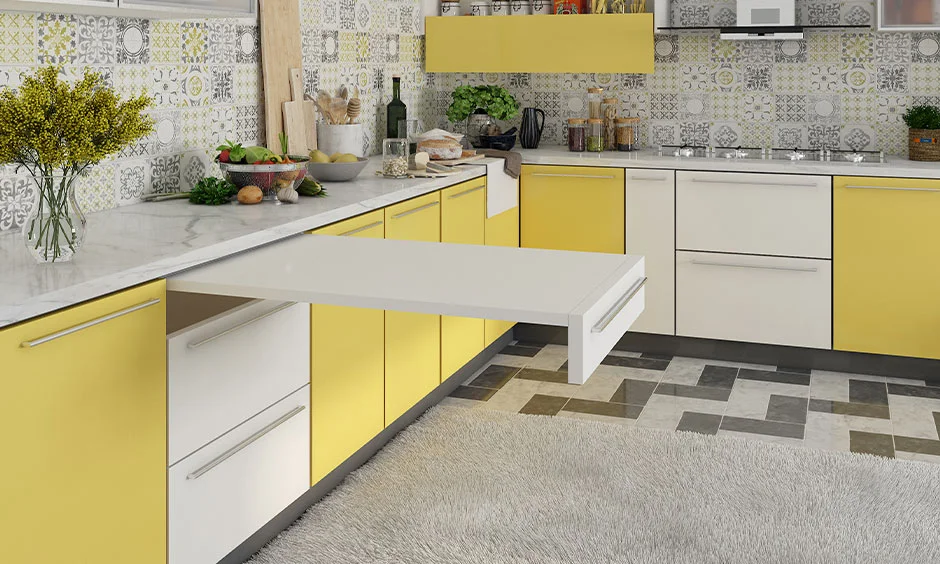 Neutral colour kitchen base cabinet with a pull-out custom-made chopping board functionality